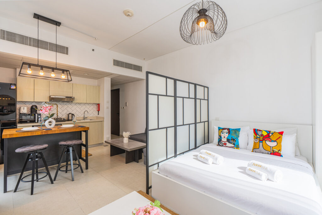 Chic Studio | Balcony with Pool & Skyline Views