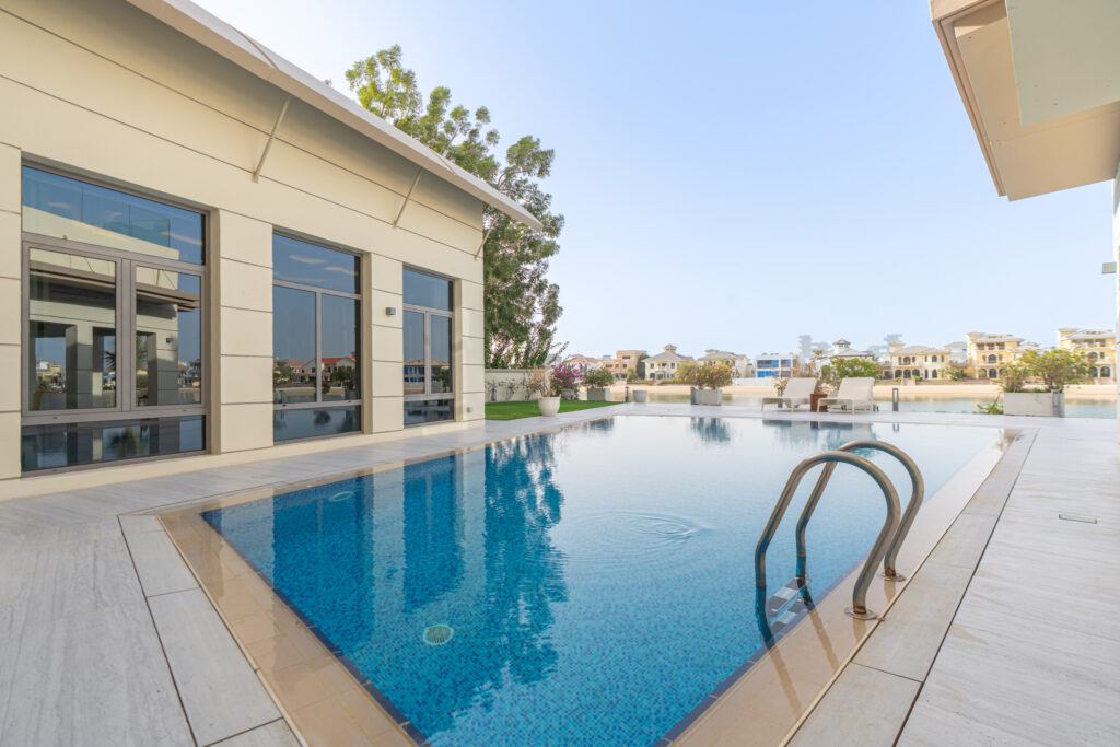 Luxurious Palm Beachfront Living | Stunning 6BR