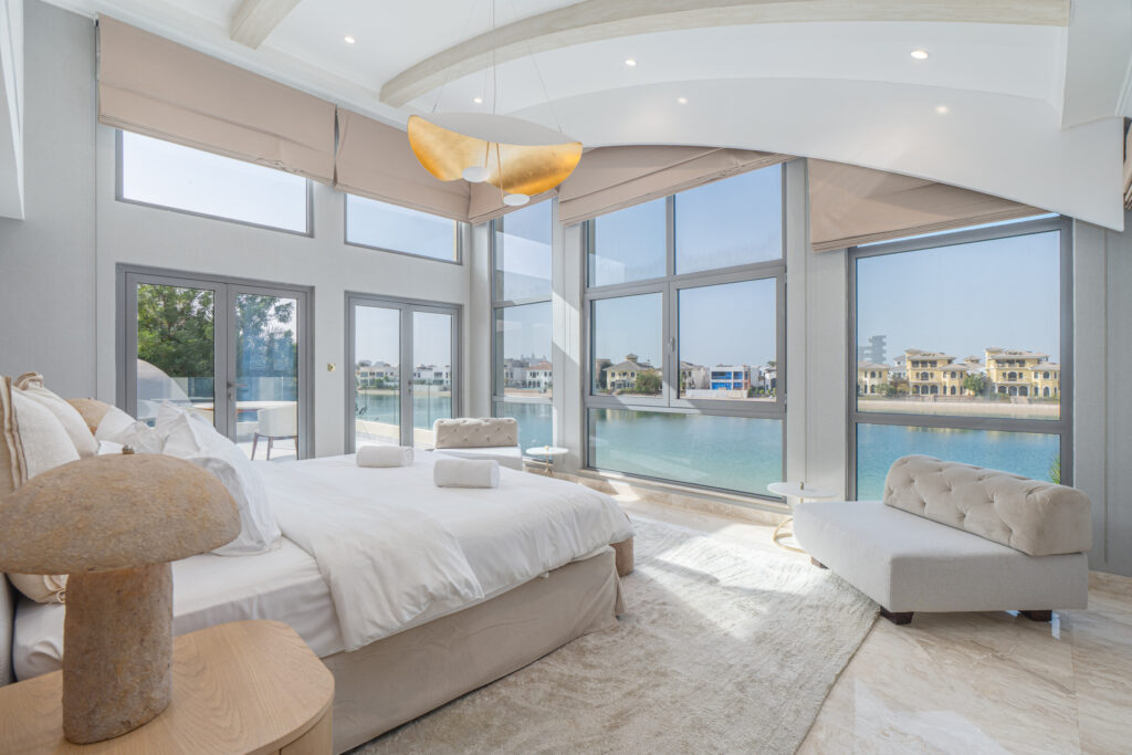 Luxurious Palm Beachfront Living | Stunning 6BR